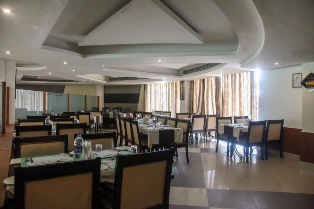Fabhotel White Dammar 트리반드룸 외부 사진